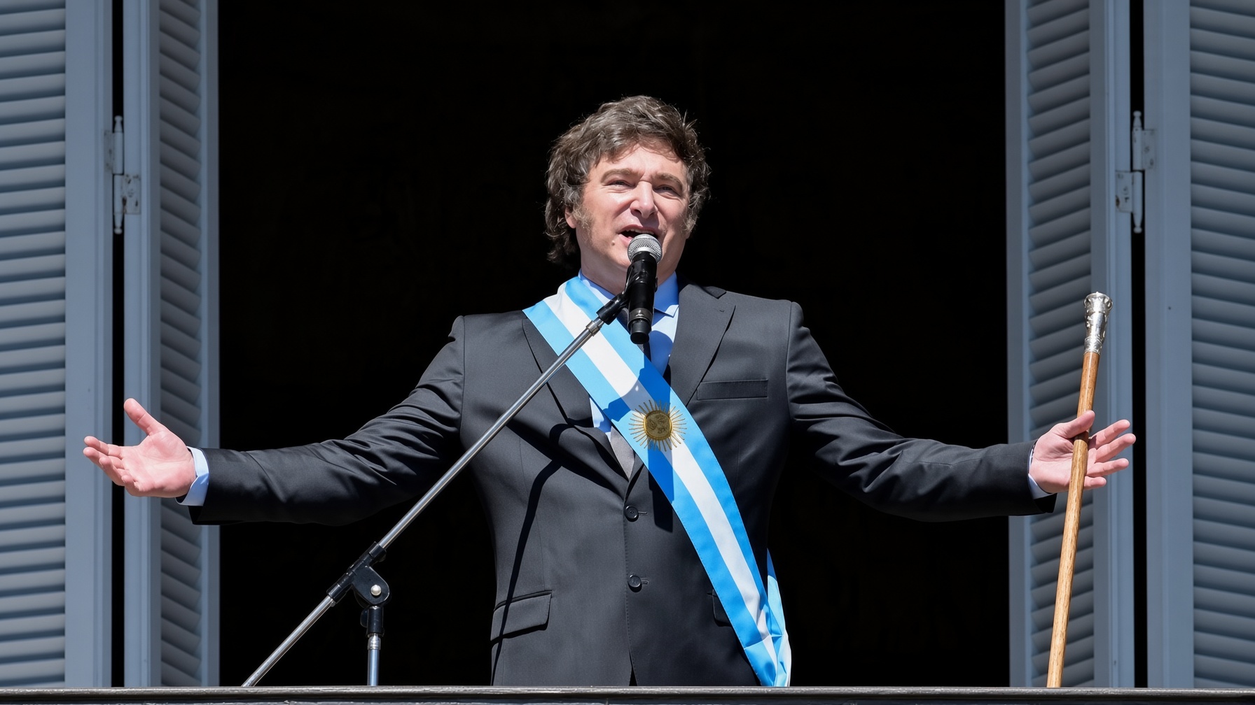 Javier Milei on the balcony of Casa Rosada, wearing the presidential sash